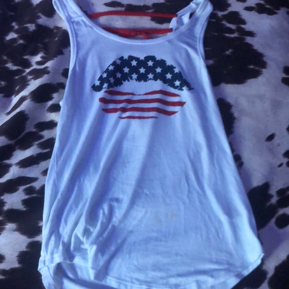 I’m selling a cute Fourth of July shirt made of 100% recycled polyester material